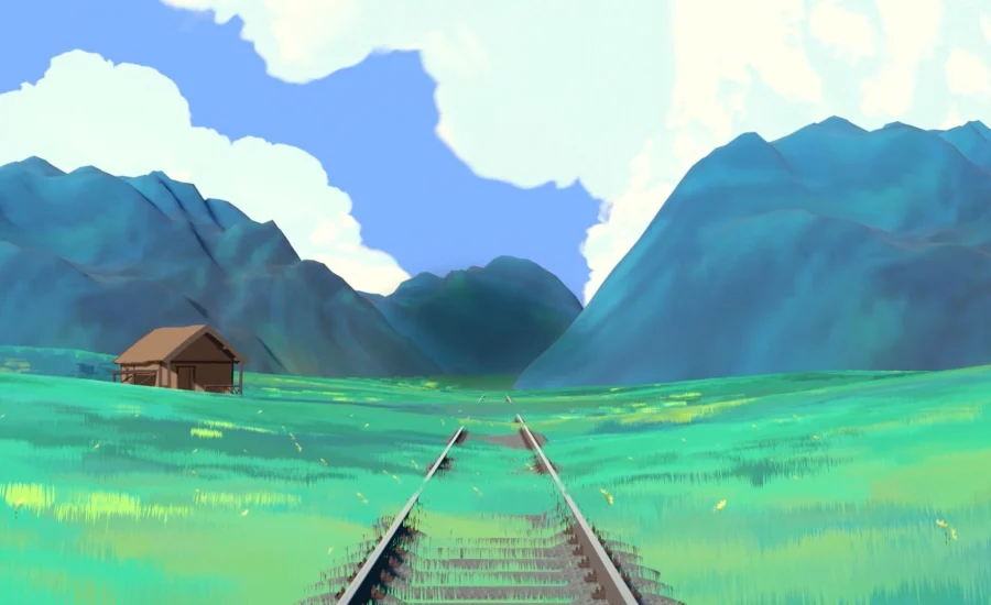 Eisenbahnschienen in einer weiten, grünen Wiese vor hohen Bergen und blauem Himmel.